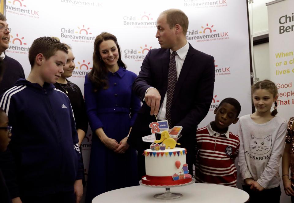  The Royals cut a cake to celebrate the one year anniversary of the charity's branch in Stratford, east London