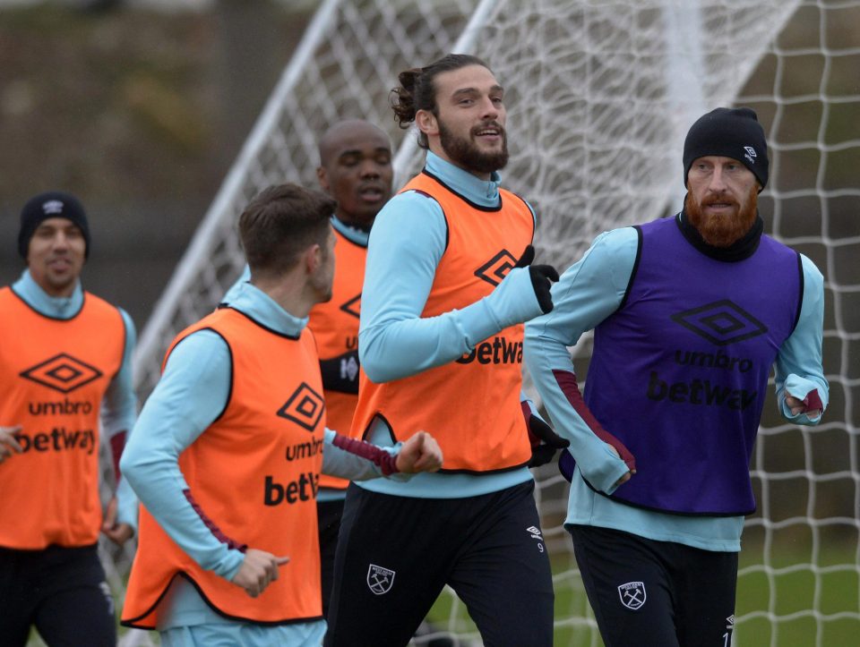  Andy Carroll seemed relaxed at Rush Green today - despite the news that French playmaker Payet has demanded a move