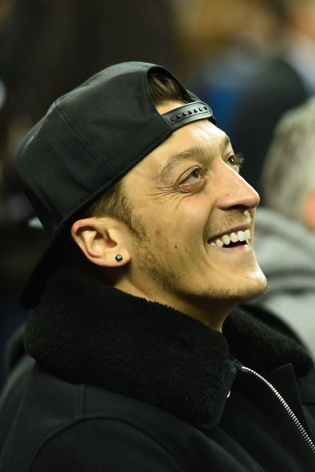  Ozil enjoys a night out watching basketball