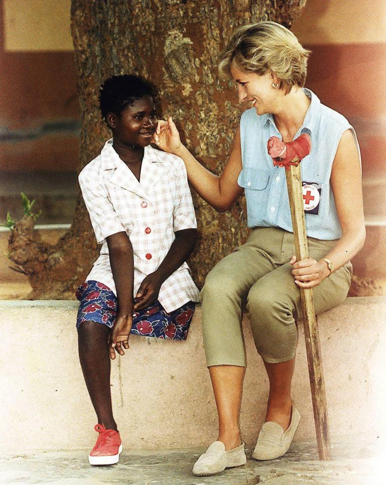  In another of the iconic images from the trip, Diana met with landmine victim Sandra Tigica, who had lost a leg to the horrific mines