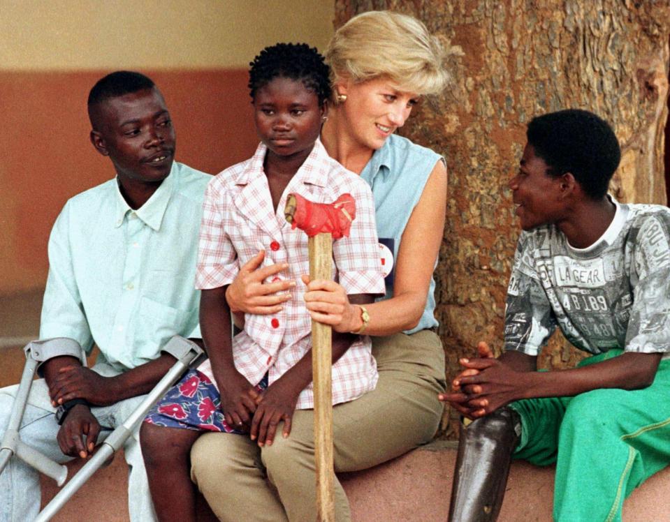  Her visit to a centre for amputees in the town of Huambo became one of the iconic images of the trip to Angola