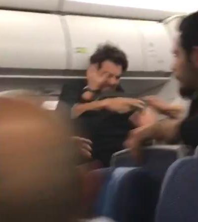  Passengers were forced to sit and watch the fight