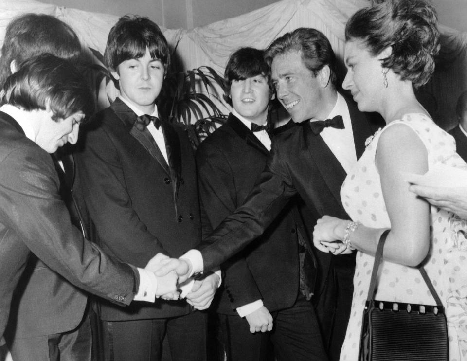  The Beatles, left, meet Lord Snowdon and Princess Margaret, right, at the premiere of the film Help in 1965