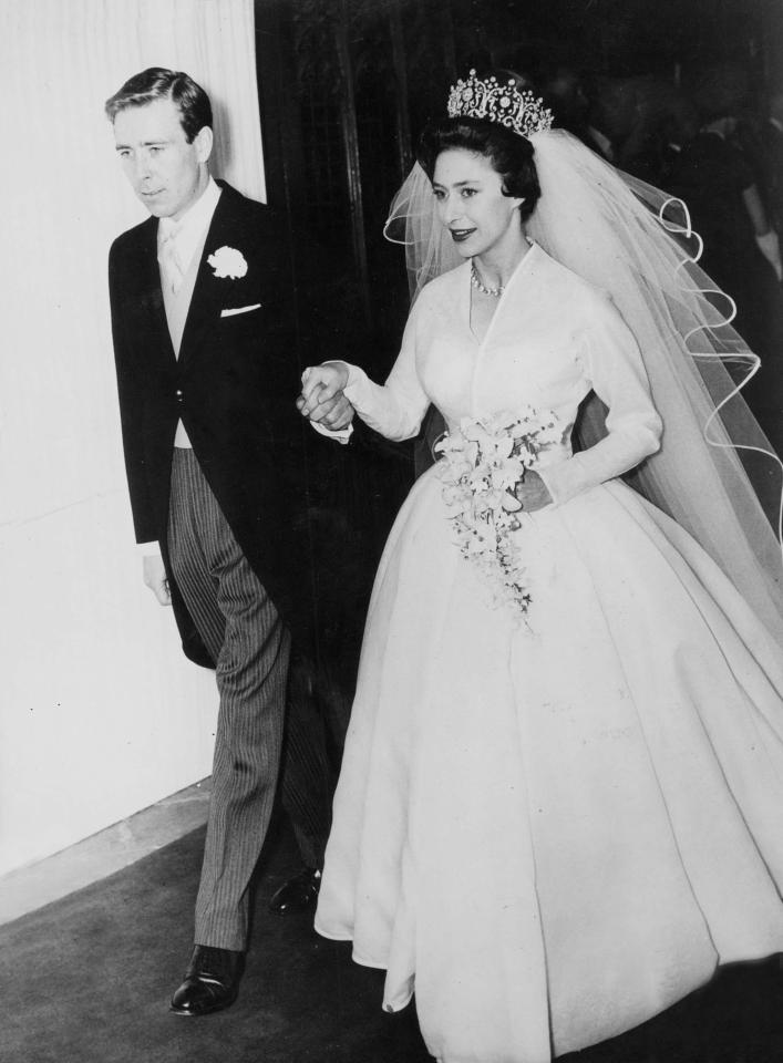  Lord Snowdon and Princess Margaret hold hands at their wedding at Westminster Abbey in 1960