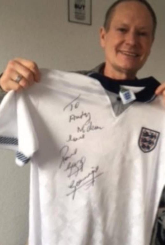  The star is pictured advertising signed England shirts