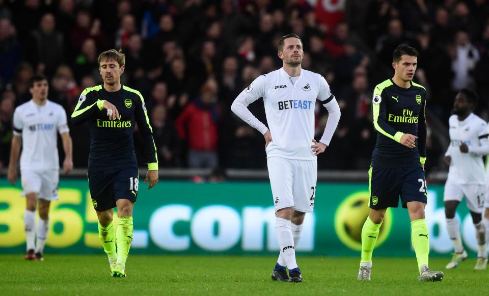  Gylfi Sigurdsson looked dejected as Swansea conceded two own goals