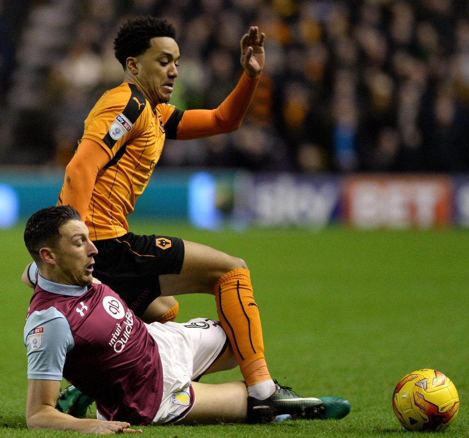  Wolves' Helder Costa challenges Tommy Elphick