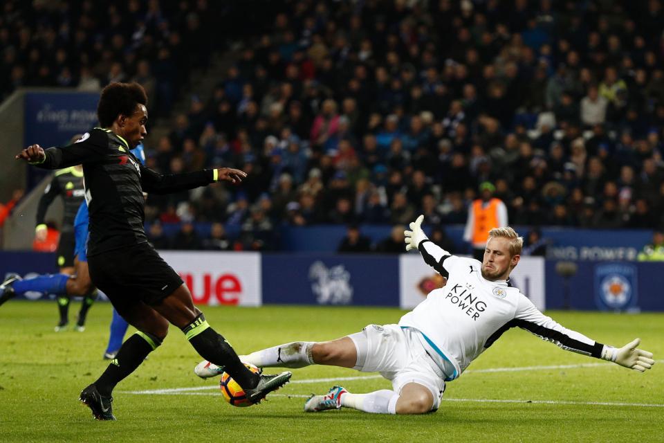  Schmeichel in action against Chelsea stopping Willian at the King Power Stadium