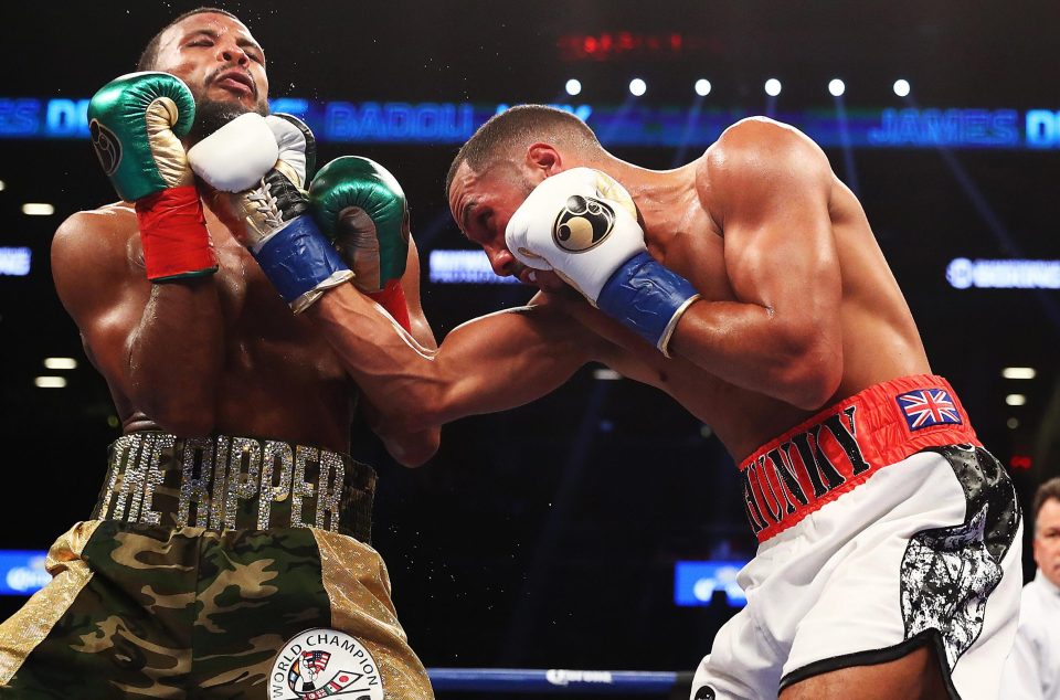  The Brit lands a clean uppercut on Swedish champ Badou Jack