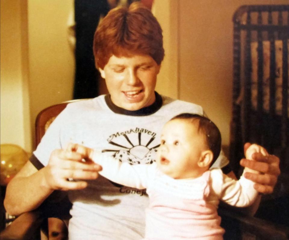  Meghan Markle as a baby with her half-brother Thomas Markle Jr