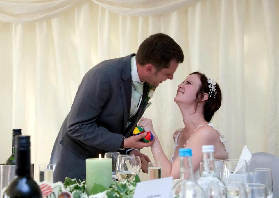  Laura and Philip, pictured on their wedding day, are planning the trip of a lifetime