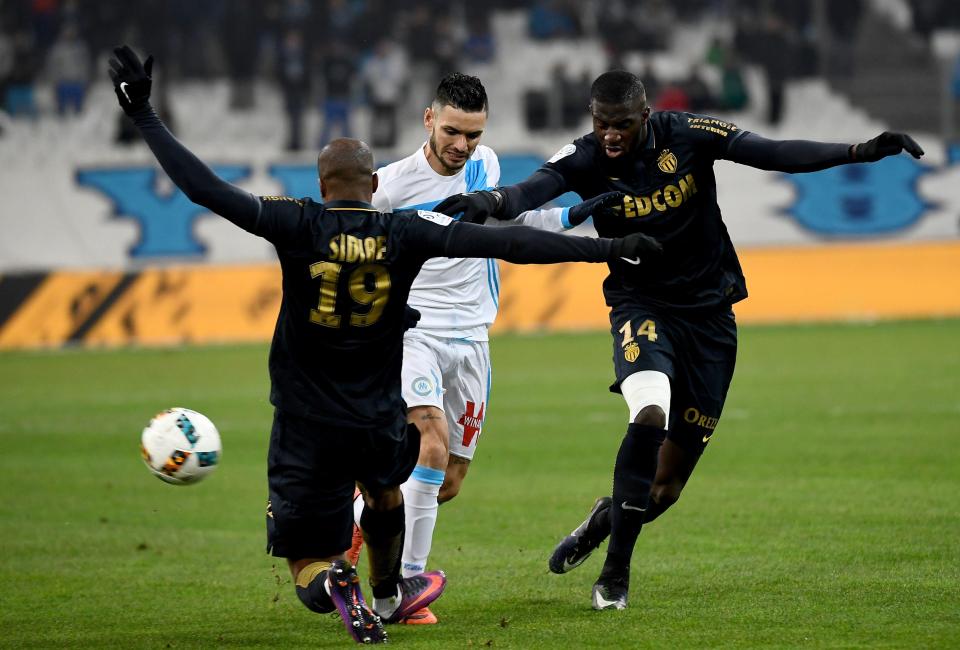  Djibril Sidibe studs Remy Cabella in the shin