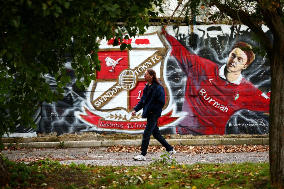  Fans arrive at the stadium for the Sky Bet League One match between Swindon Town and Bolton Wanderers at County Ground