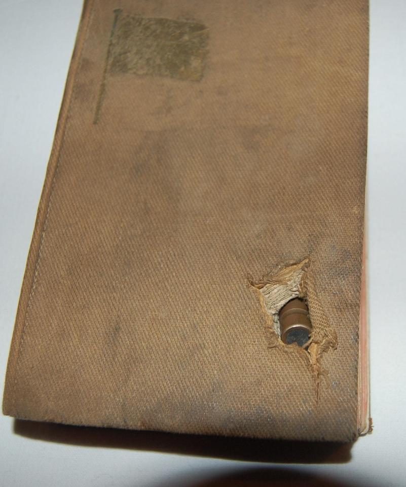  Pocket bible saved the life of a teenage First World War fighter after it too the impact of a German bullett