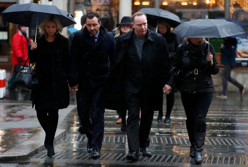  Families yesterday are seen arriving for the start of the inquest