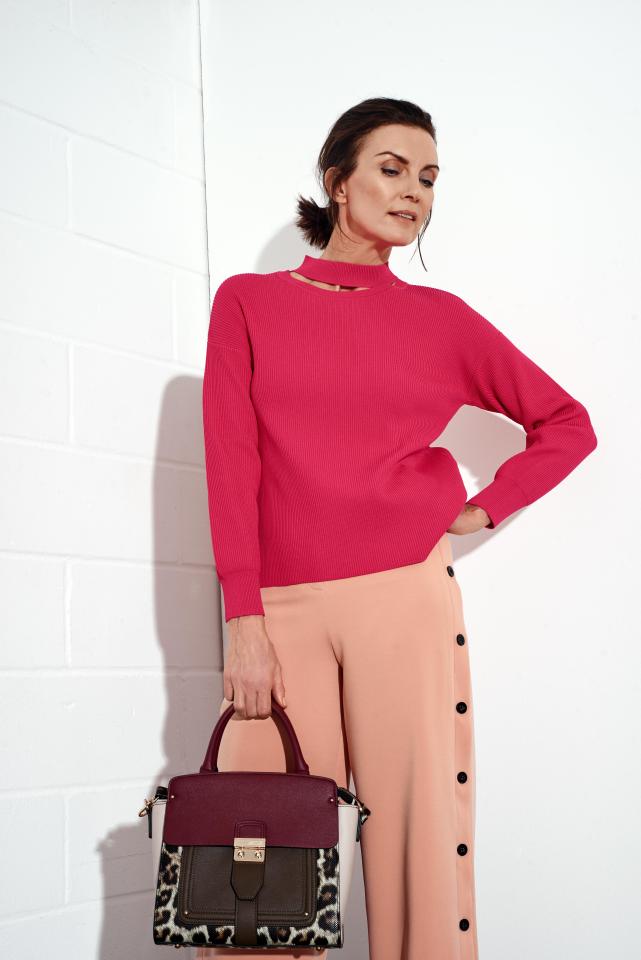  Jumper, £45, Topshop; flared trousers, £62, lavishalice. com; leopard- print bag, £35, Accessorize