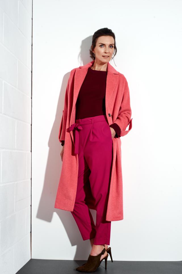  Pink slouchy coat, £79, Topshop; burgundy jumper, £24.99, H&M; cigarette trouser, £24.99, New Look; heeled boots, £35, M&S; earrings, £10, Topshop