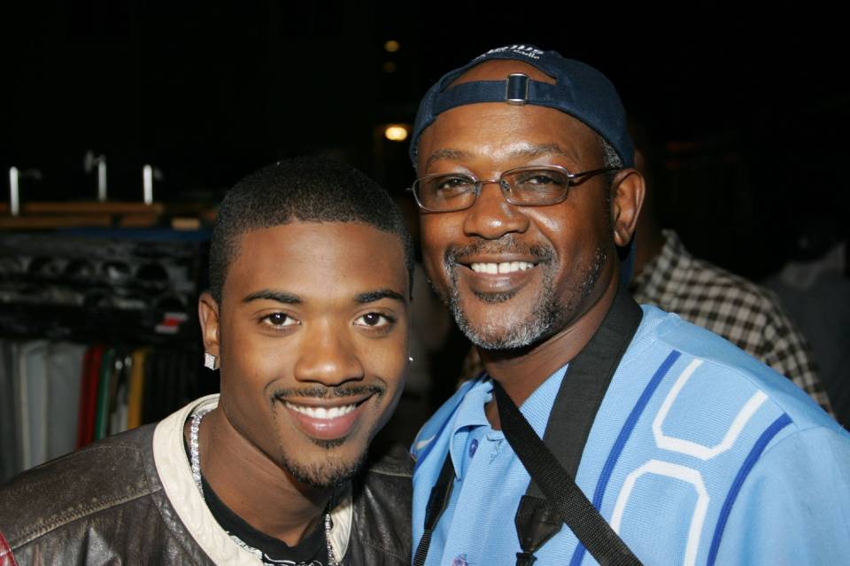  A fresh-faced Ray J with his musician father Willie Norwood in 2005