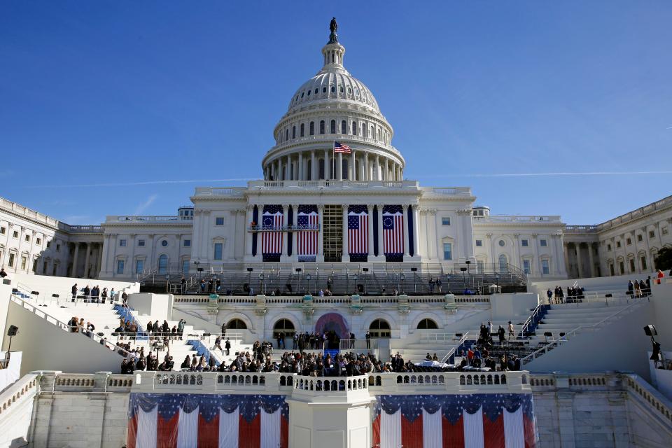  The U.S. Capitol frames the backdrop over the stage during a rehearsal of President-elect Donald Trump's swearing-in ceremony in Washington