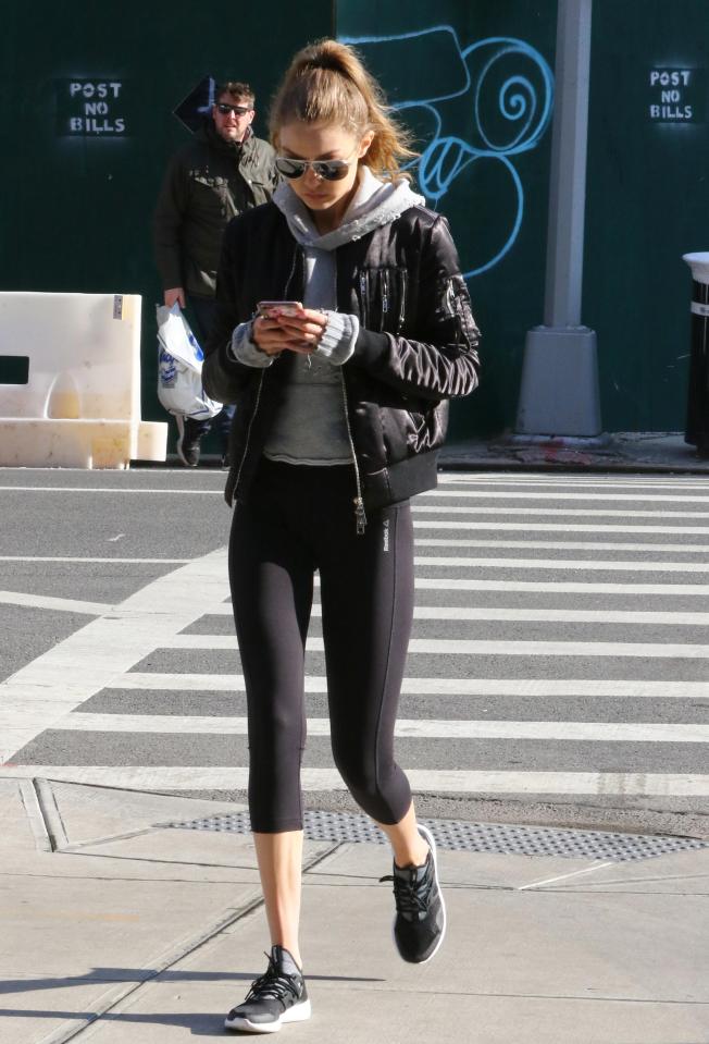  Gigi's slender band shone from her left hand