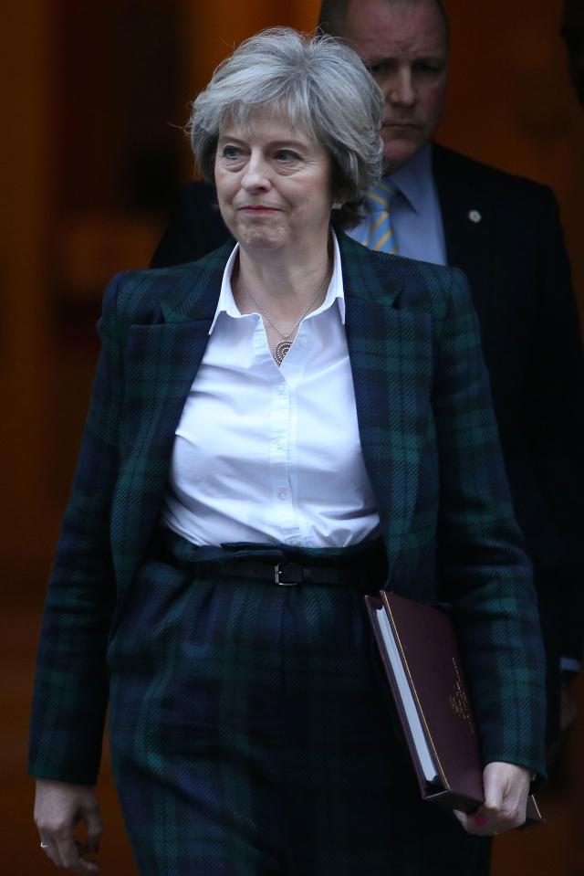  Key to our future . . . Theresa May wears her lucky Vivienne Westwood suit for Brexit speech