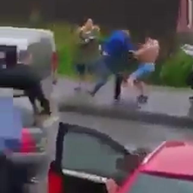  Police have arrested two people over the street brawl