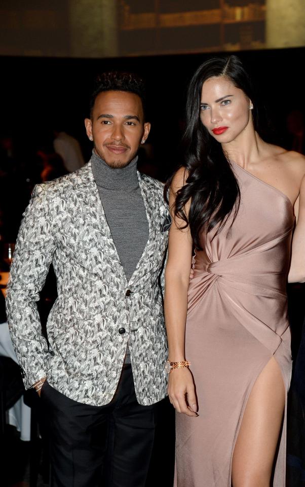  Lewis Hamilton and Adriana posed together at the bash