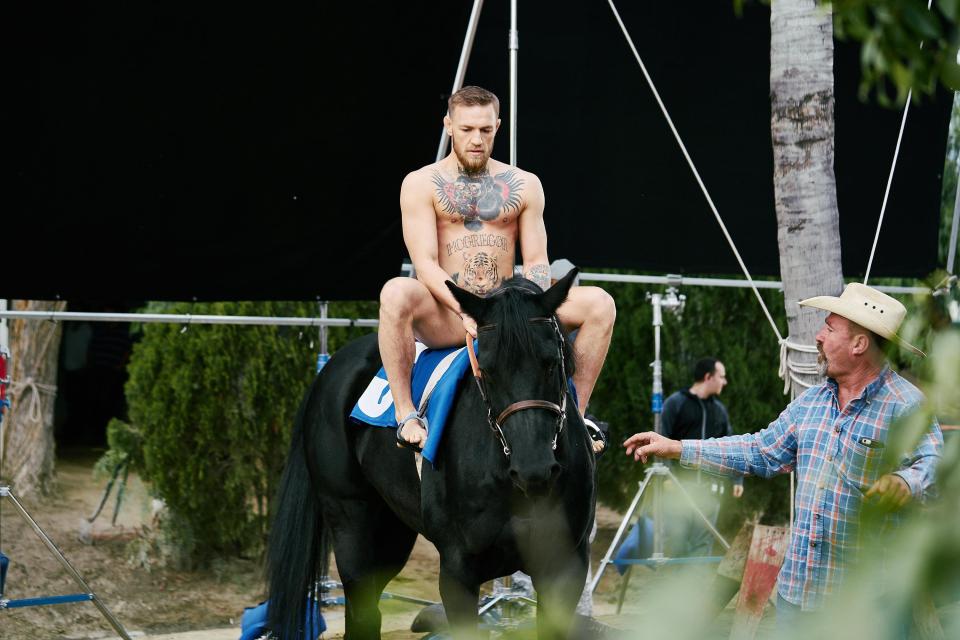  Conor McGregor looks to be naked while riding the horse