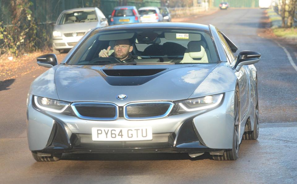  Plugged in . . . Roo also drives a £104,000 BMW i8 hybrid motor