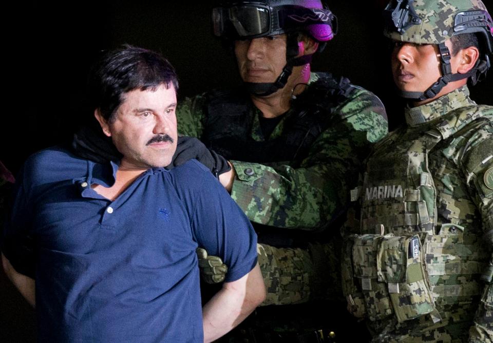  El Chapo is paraded for the cameras after he was recaptured by soldiers last January