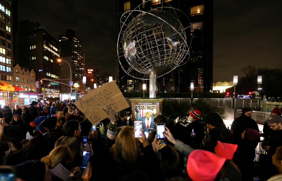  Others gather in front of Trump International Hotel in Columbus Circle, New York