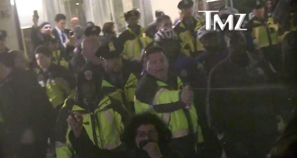  A cop can be seen spraying the crowd as things got out of hand