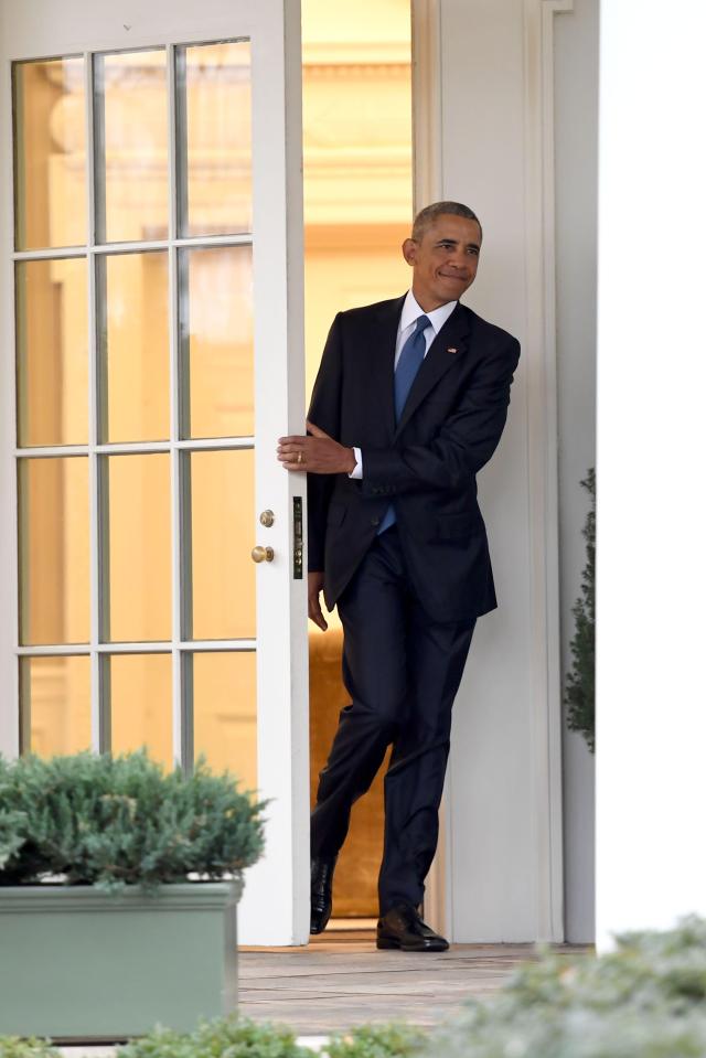  President Barack Obama flashed a smile as he left the Oval Office for the final time