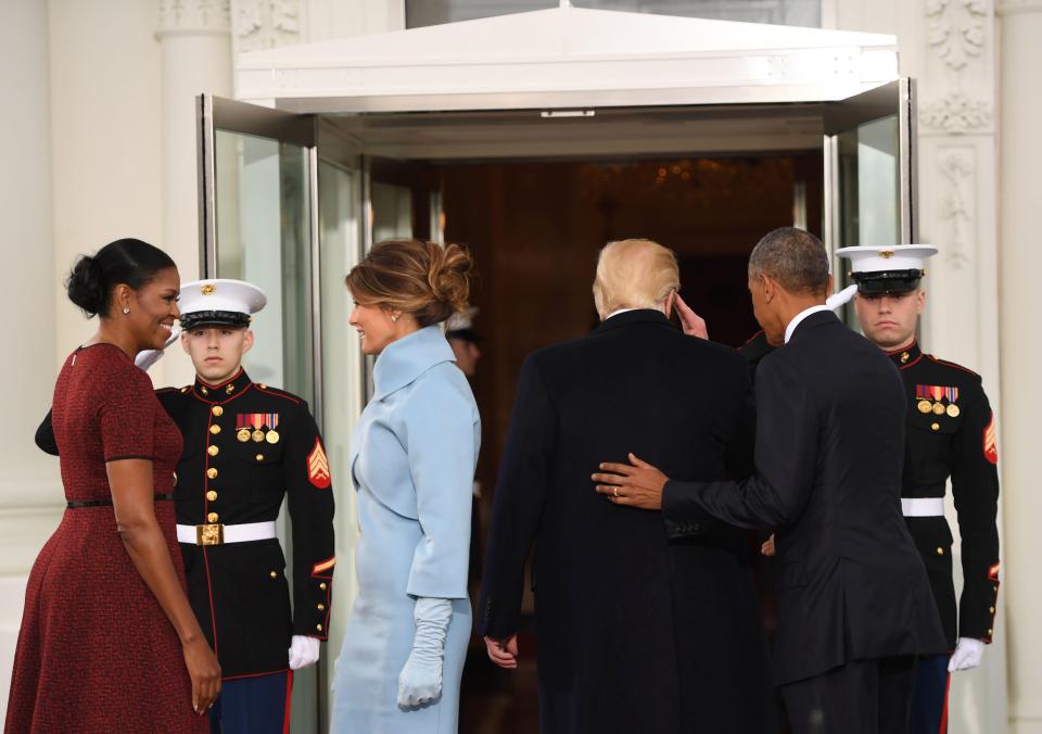  Trump saluted the soldier on the door as he made his way inside the White House