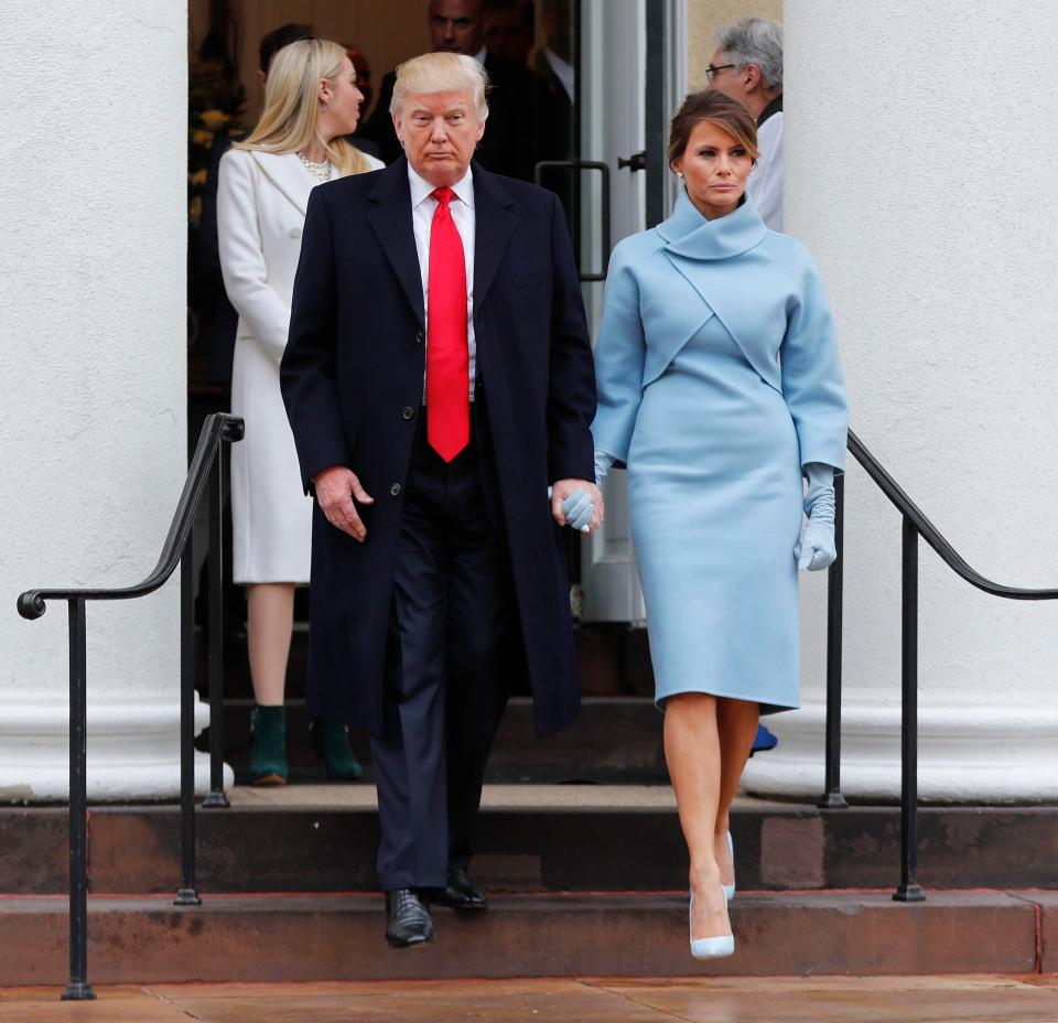  The billionaire looked down in the dumps with wife Melania