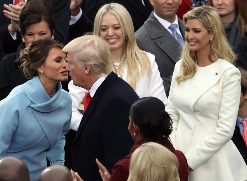  The sisters look on with delight as Melania and Donald Trump share a tender moment ahead of the ceremony