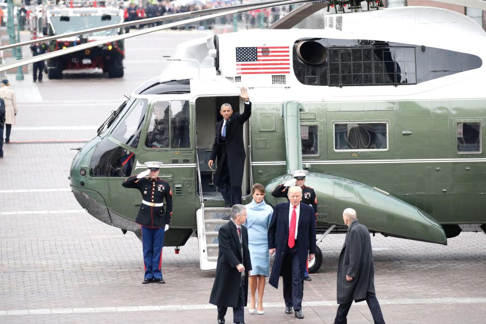  Obama waved at the crowds when he left the ceremony in a helicopter