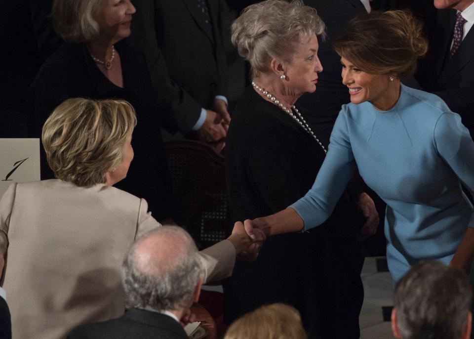  Clinton also shook First Lady Melania's hand at the Inaugural Lunch