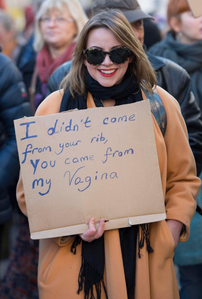  Charlotte Church smiled for the cameras as she joined the demonstration - after turning down an invitation to sing at Trump's inauguration