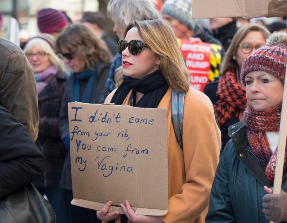  Singer Charlotte Church spotted during protest in Cardiff, south Wales with a sign reading: 'I didn't come from your rib, you came from my vagina'