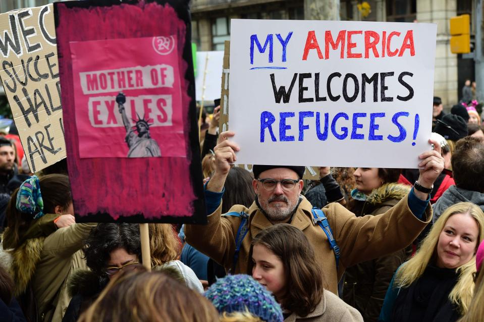  'My America welcomes refugees' says anti-Trump protesters