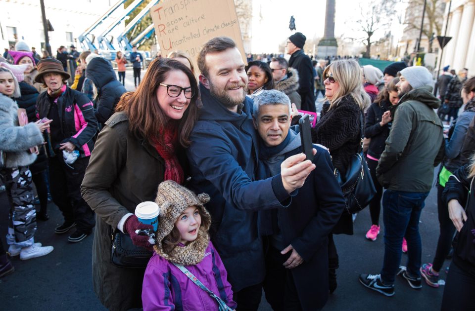  One protesting family grab the London Mayor to take a selfie as they walk along the march