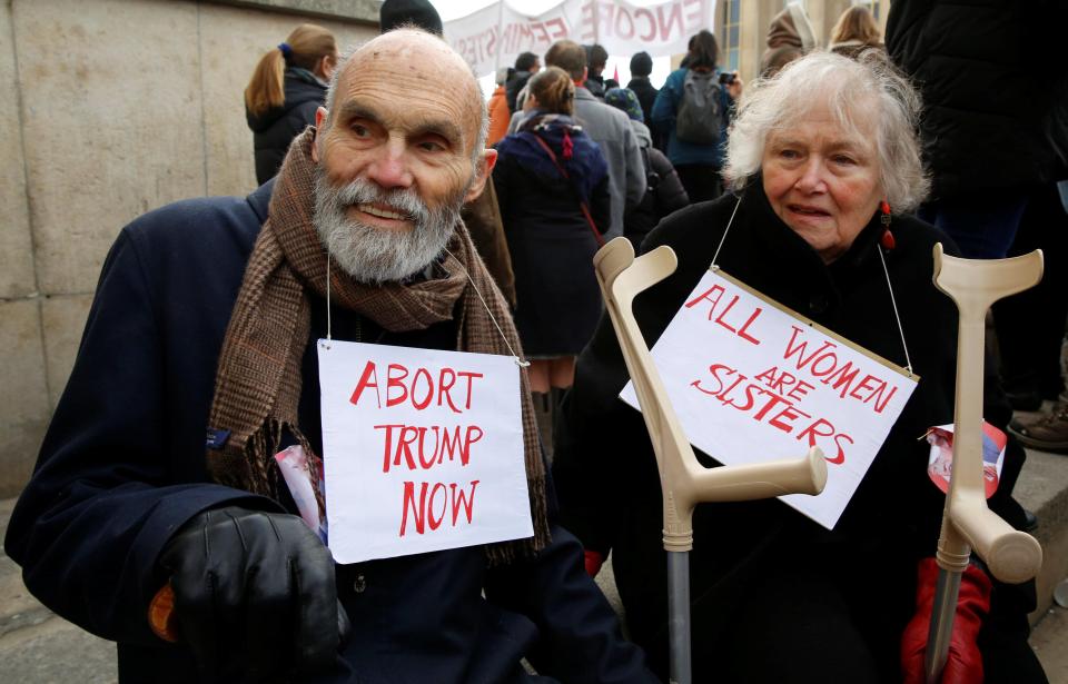  Elderly couple turn out for the march with their crutches