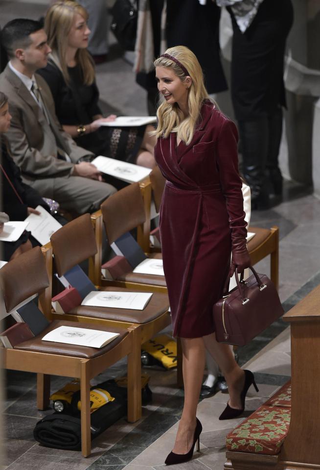  Ivanka looked stunning in a burgundy wrap dress with a matching handbag