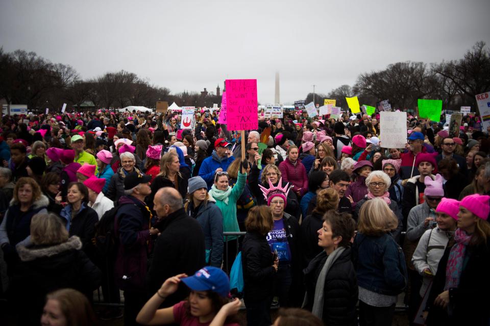  Many wore hand-knitted pink 'pussyhats' to represent female empowerment