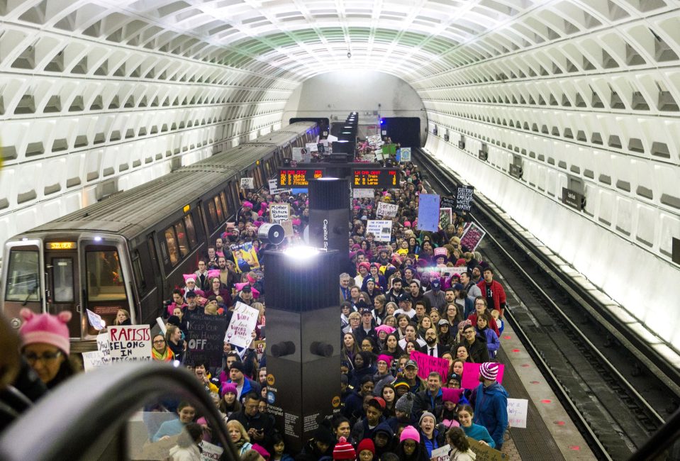  Marchers make their way to the event on the DC Metro