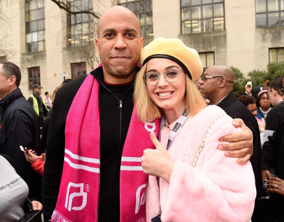  Katy Perry attend the rally at the Women's March on Washington with politician Cory Booker