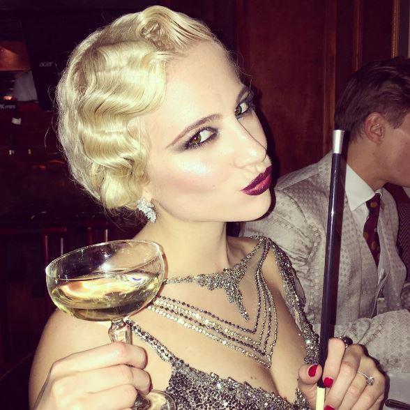  Cheer's old sport! Pixie has a tipple to ring in her birthday