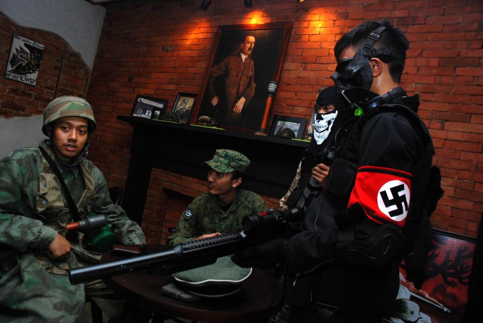  A picture of Hitler can been above the fireplace in the now-closed Nazi-themed cafe in Bandung, Indonesia