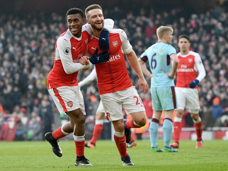  Alex Iwobi congratulates Mustafi on netting his first Gunners goal